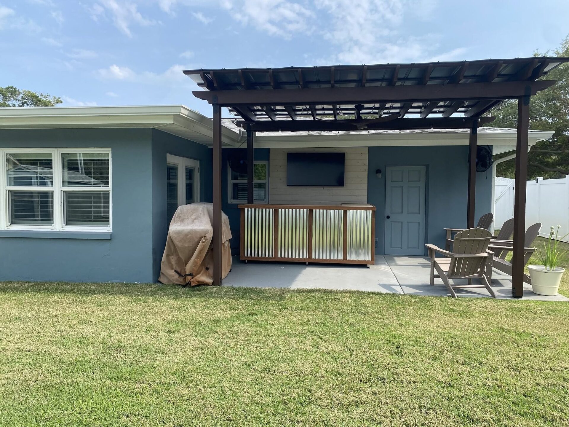 Backyard pergola and patio Reliant built behind a Pinellas County home
