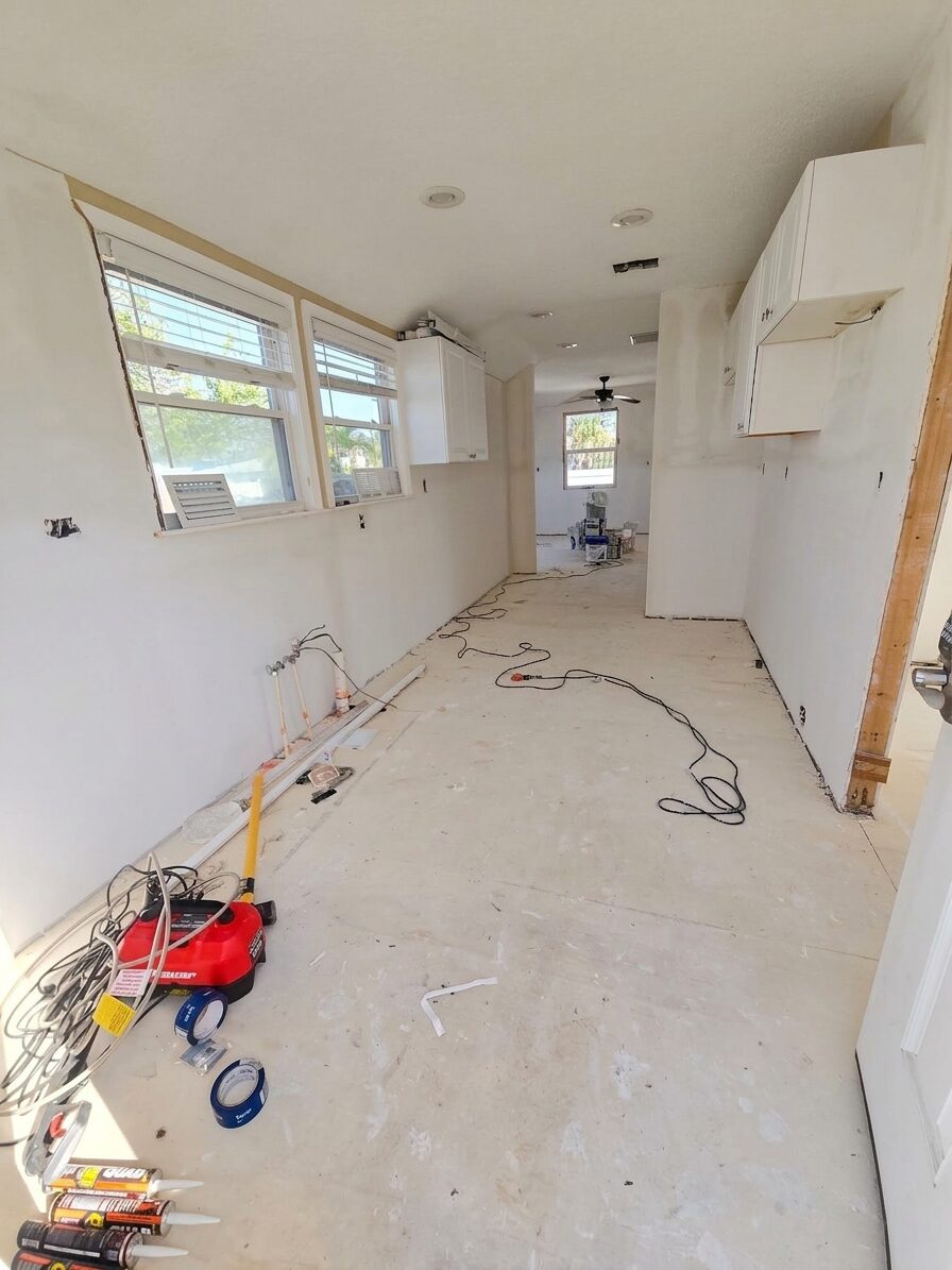 New drywall going up inside the Isla Breeze bungalow during its rebuild